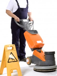 Cleaning floor with machine